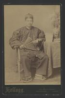 Seated man in Chinese clothing