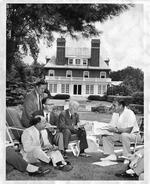 Governor Ribicoff with reporters at executive residence, Hartford, July 7, 1955