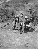 Peter Anthony on old Jeep,30,"Korea, area of 38th parallel",Peter Anthony,1954,unknown,"Peter Anthony on old Jeep;Korea, area of 38th parallel;Peter Anthony; 05/1905; Photograph by unknown"