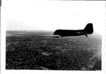 Bergstrom Bomber in flight C-47 over Texas