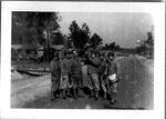 William Bormolini and barracks 14; 01/26/1944. William is in the second row squatting down