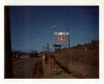 Sign outside Camp Gary Smith (named for the first US casualty in Bao Loc province). Main gate at the Bao Loc base camp, RVN. 1968. Photographed by John E. Boss Jr.