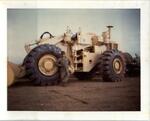 John E. Boss Jr. Standing next to 572nd LE (light equipment) company bulldozer. Bao Loc, RVN. 1969.
