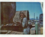 Robert Young cutting D-7 bulldozer blades. Bao Loc, RVN. 1969. Photographed by John E. Boss Jr.