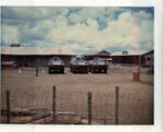 Cadillac Gage �Commando� armored cars parked in the ARVN motor pool. Bao Loc, RVN. 1969. Photographed by John E. Boss Jr.