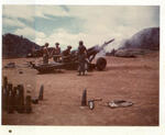 105mm howitzer crew firing in support of the 173rd Airborne Brigade. Rock quarry in Bao Loc, RVN. 1969. Photographed by John E. Boss Jr.