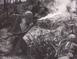 Unknown soldier using a flame thrower in Guam in 1945
