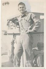 George Butenkoff leaning on a landing craft mechanism Fort Eustis, VA 1954