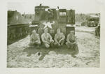Normand Henry Carleton and others in front of M-7 105 S.P. Camp Gordon, GA 1944