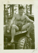Normand Henry Carleton sitting on Jeep after swimming Camp Gordon, Georgia 1944