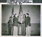 (L-R) General Newgarden, Col. Beverly receiving battle colors Camp Gordon, GA 1944