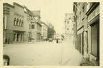 A movie theater, on left, where the boys congregated on Main Street Memmingen, Germany; September, 1945