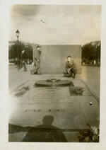Normand Henry Carleton kneeling in front of the French Unknown Soldiers Tomb Paris, France September, 1945