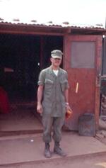 Ted Cantrell outside company office; QuangTri, U.N.; June 1968; Photographed by Bill Strickland