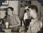 Visiting the priest; Vietnam; Vietnamese Hamlet Chief from Cao Xa, Major Lopez;  1966-1967;  Photograph by unknown