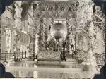 View from center nave looking toward altar. Note three apostle's chairs in front of Pope's throne; Tay Ninh, Vietnam; none;  1966-1967;  Photograph by unknown