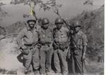 Sgt. Douglas (left, arrow) Clement and three unknown South Korean soldiers. Clement had shared a can of mushrooms that were mixed into the rice balls that these men had as rations. Korea, Fall 1951.