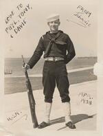 John Conforti with Springfield rifle and USN uniform. 04/1938.