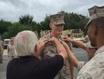 Getting rank pinned on by Mike Wren and Sgt Cassagnol; Virginia Beach, VA; September, 2015; Photographed by Cpl Camargo