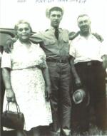 L to R:  John�s Mom, John and John�s father at Fort Dix, NJ � July, 1949