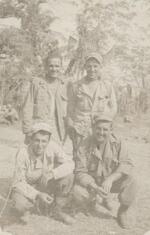 Order unknown: Captain Mike Gerick, Private First Class Beldyga, Private First Class Frank Masterbone and Captain Ray Riendeau, Luzon, Philippines, 1945