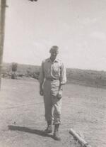 Lieutenant John J. Higgins at Japanese POW site for allied POW until Feb. 1945. Maximum number of POW: approximate 15,000, Cabanataun, Philippines, July, 1945