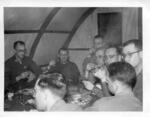 Korea; In 1953; (2nd from right with glasses) Melvin Horwitz; Melvin Horwitz, 2nd from right, is pictured with members of M.A.S.H. Unit sipping martinis