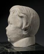 Physical object: Sculpture of Charles S. Stratton's head from a cemetery monument (side view)